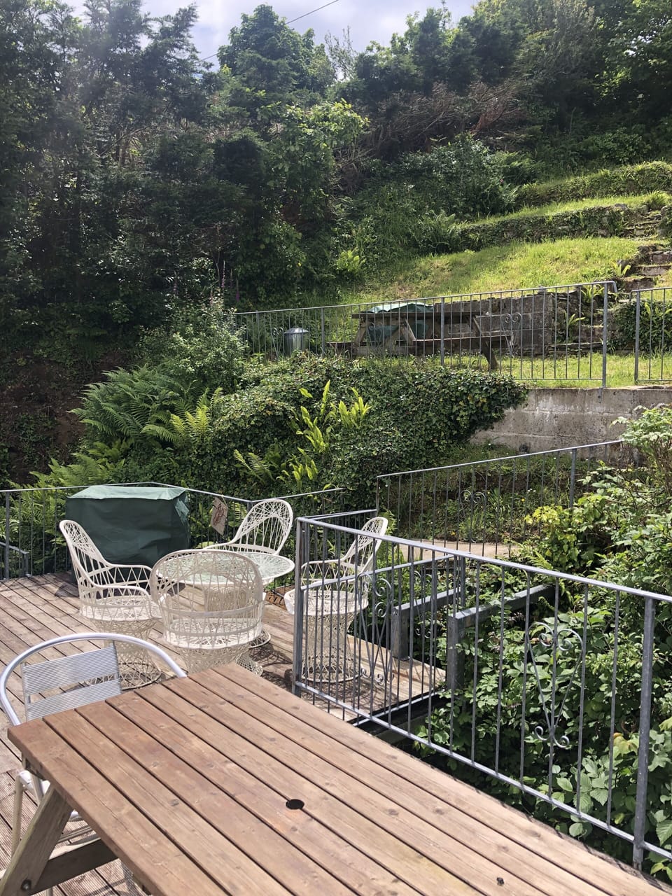 Our 2 apartments have a rear deck, bbq each and seating with garden access