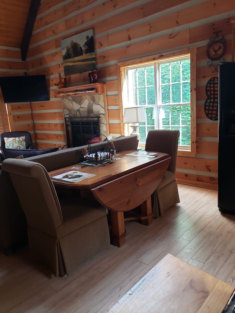 Kitchen table opens up on both side & there are two additional chairs available