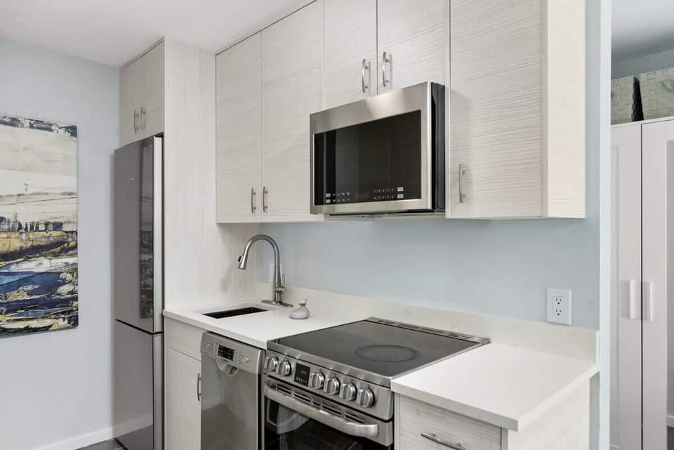 Bosch appliances including refrigerator, dishwasher, range, microwave. All small appliances also provided.