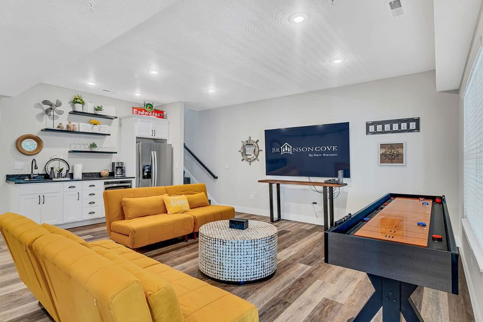 Kids and adults alike will have a marvelous time in the downstairs game room.