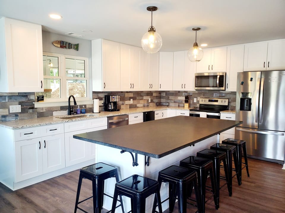 Spacious kitchen with island and plenty of seating.