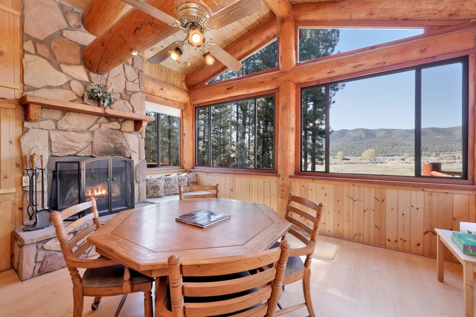 Game table in disignated game room with cozy fireplace
