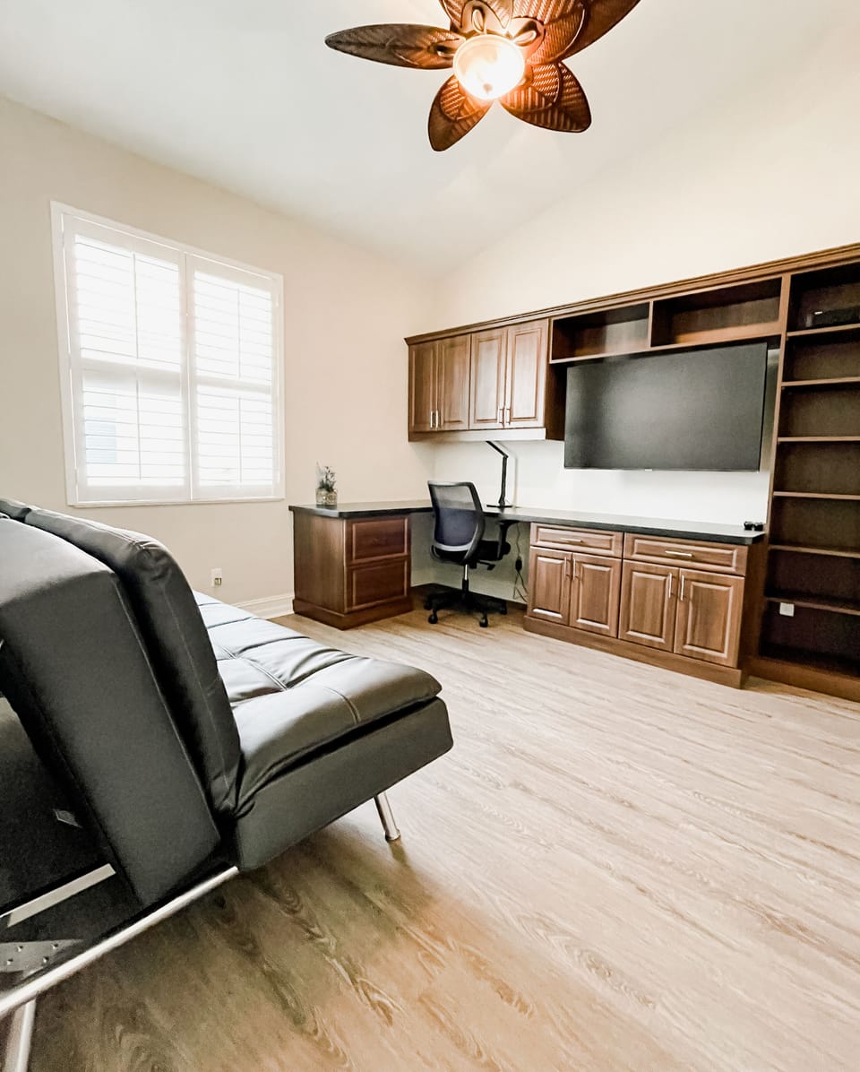 Office with Full Size Sleeper Sofa, TV, Built in Desk and Cabinetry,Large Closet