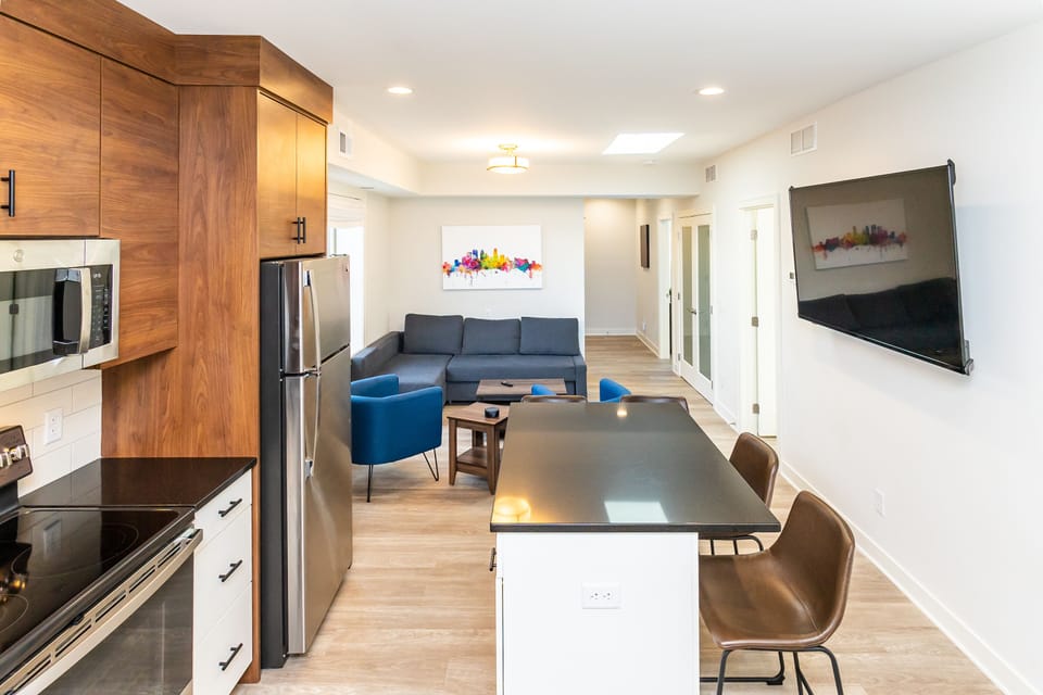 Open kitchen and living room floorplan 65" TV with YouTube TV and Amazon Prime