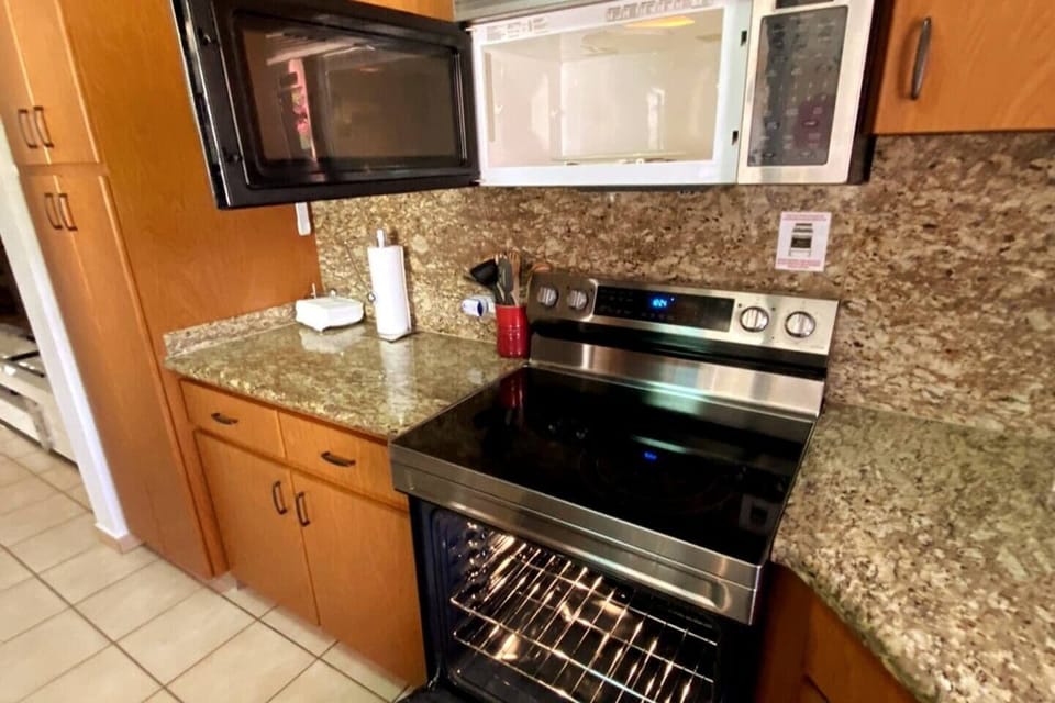 Kitchen with all necessary appliances for a comfortable stay