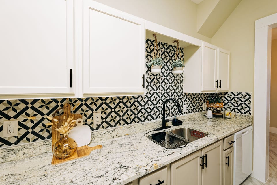 Boho themed kitchen decorations. Full dishwasher available. 