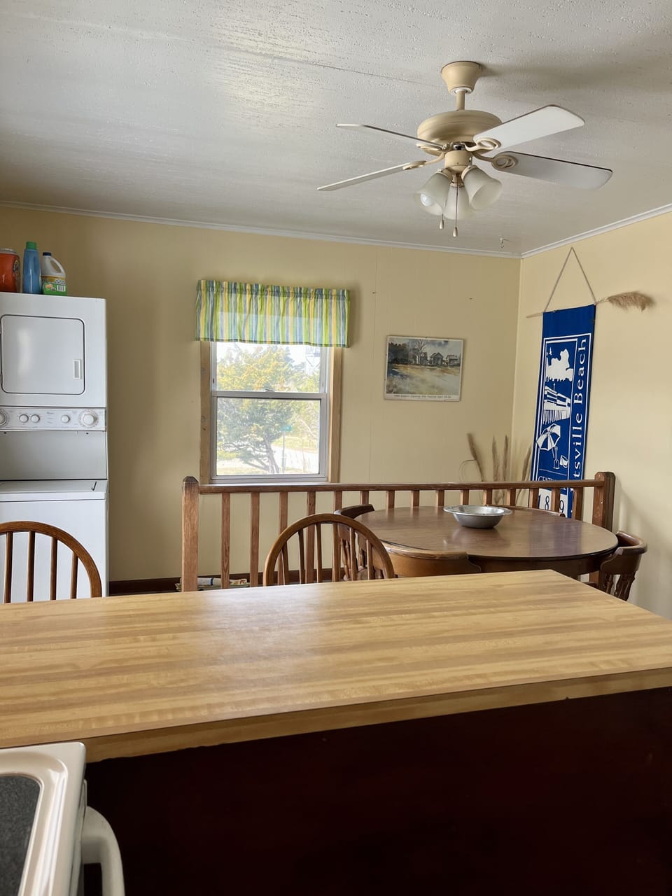 Kitchen with stack Washer/dryer