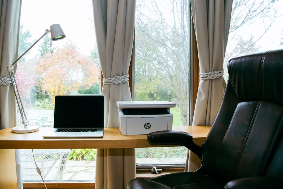 One of the bedroom studies has a 3-in-1 printer with ink and a monitor
