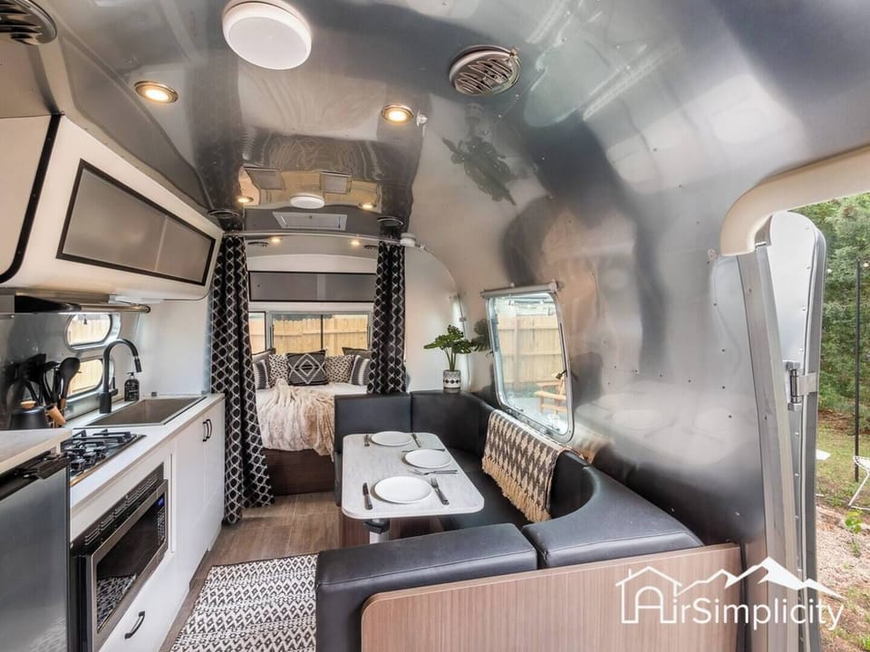 Sip your morning coffee at the nostalgic-styled dining area. Or, convert it into a sleeping space for your extra guest!