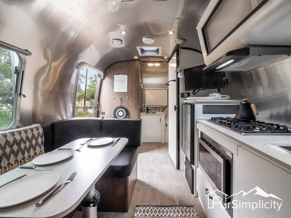 Relax with a good book or comfortably work from home in the benched dining area.