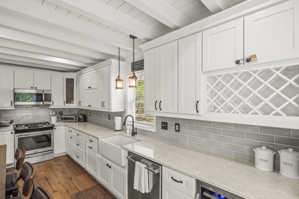 quartz counter tops, gas stove and full coffee bar
