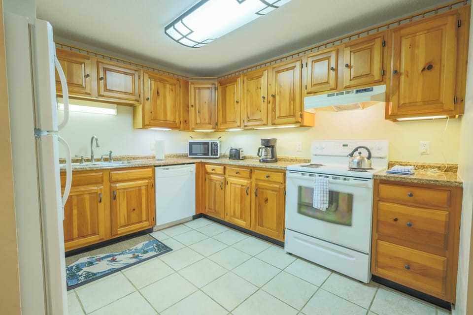 Kitchen will full size appliances dishware, flatware, glassware, cooking utensils and pots & pans.