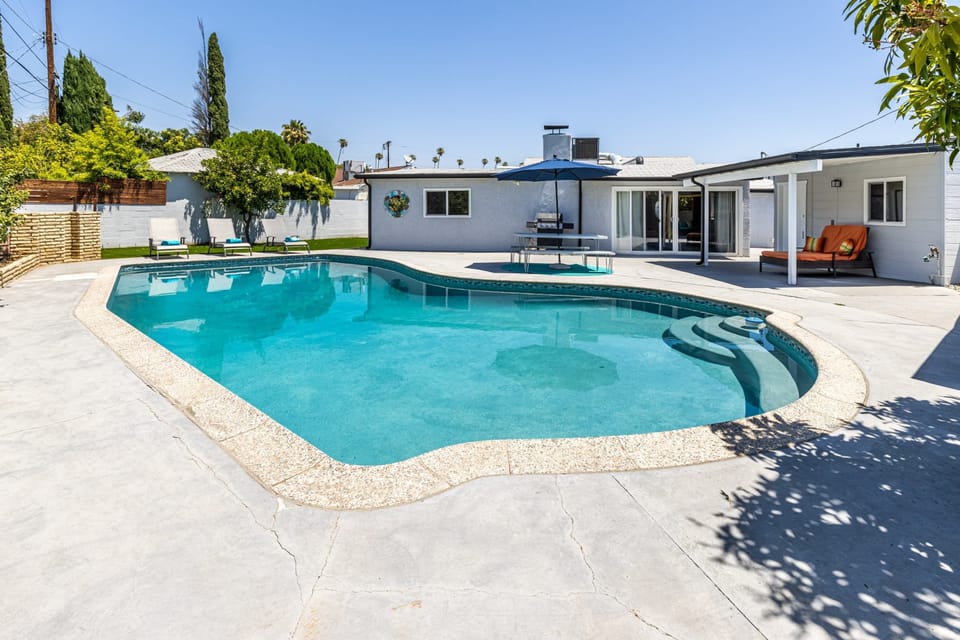 Large and sparkling heated pool (addtl $) for everyones enjoyment in the sunny backyard!