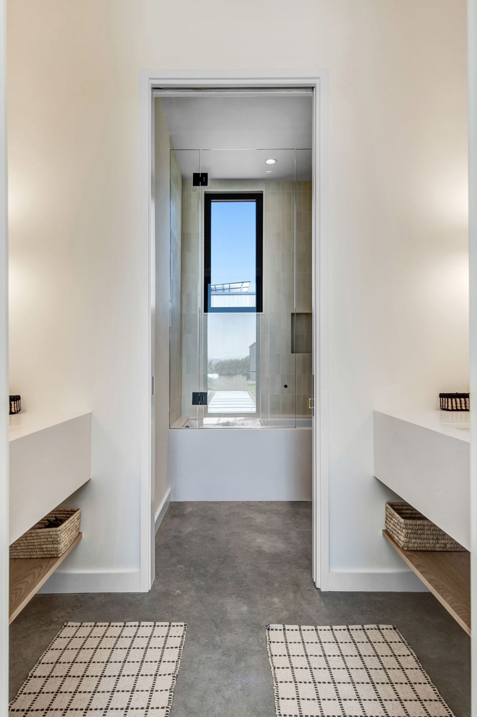 Shared bathroom for the queen bedrooms; 2 sinks, toilet and a tub/shower combo.