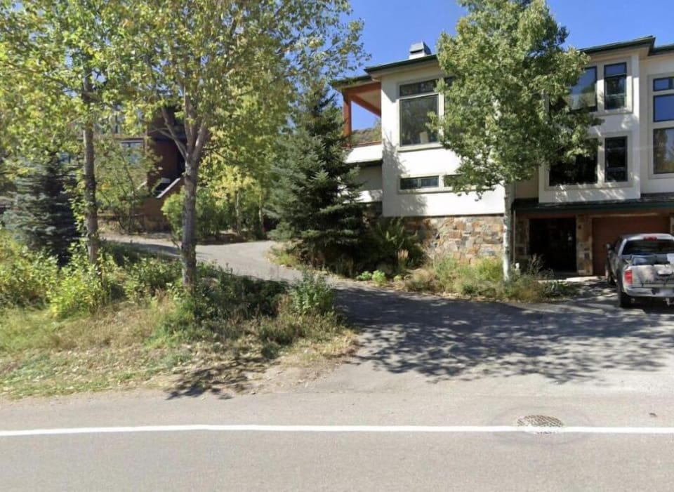Exterior from street...a duplex with the left side being the offered property.
