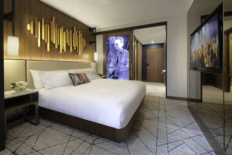 Relax in a spacious king room with bold art accents.