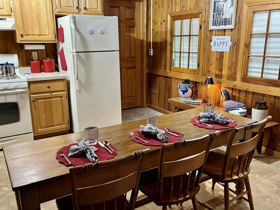 Eating area and kitchen, plus sky lights make this a cozy gathering area..