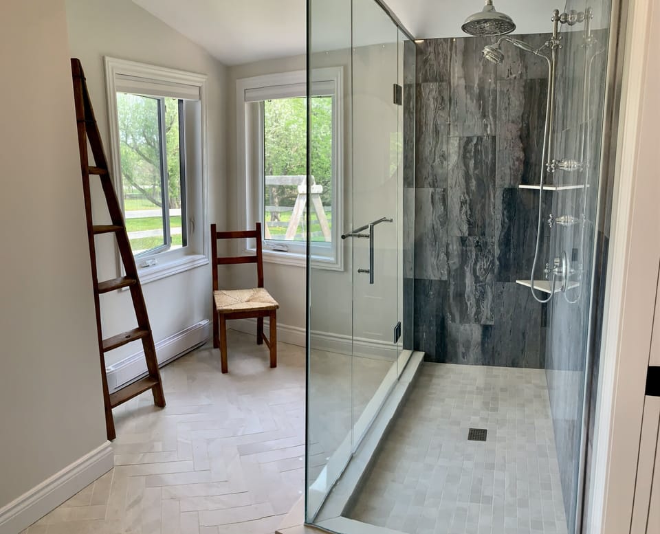 Main floor bathroom with large walk in shower.