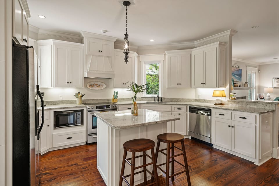 Fully stocked kitchen with coffee maker, keurig, toaster, blender, & microwave