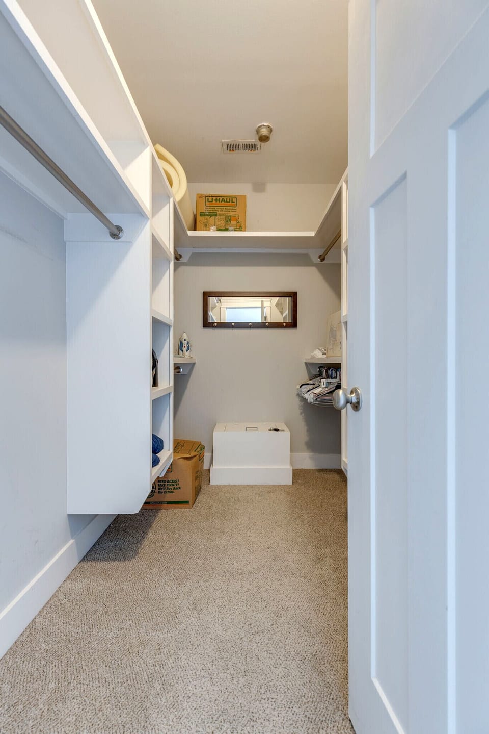 Primary bedroom's extra large walk-in closet.