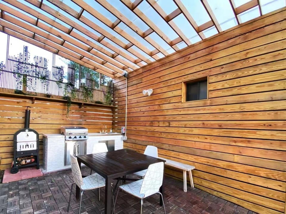 Gated Backyard Patio & Kitchen with BBQ Grill and Pizza Oven
