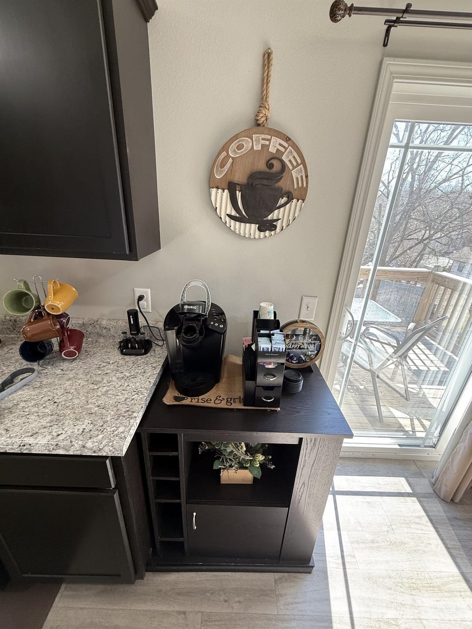 K cup coffee maker and standard coffee maker on counter for your convenience. A starter amount of bottled water, k cups, sugar and creamers are provided.