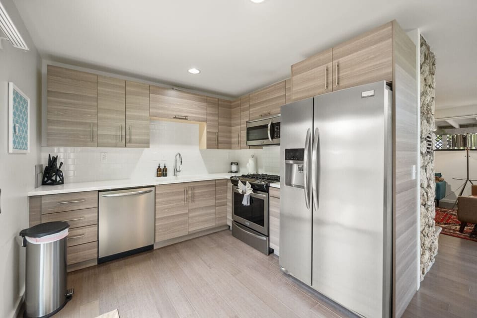 Updated modern kitchen stocked for your cooking needs