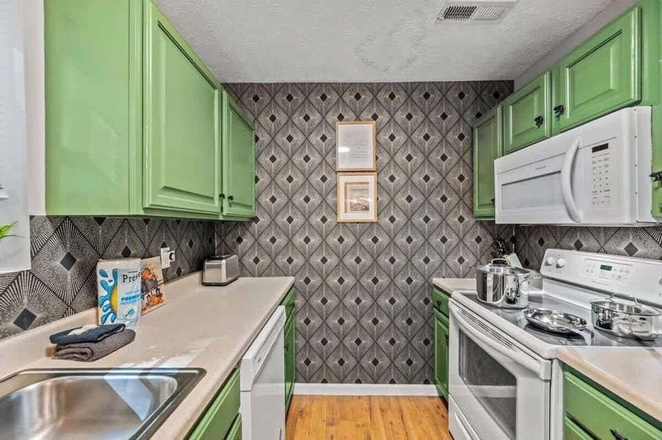 Fully equipped with all the pots and pans! The sleek design and contemporary finishes make cooking a breeze, allowing you to enjoying the comforts of home!