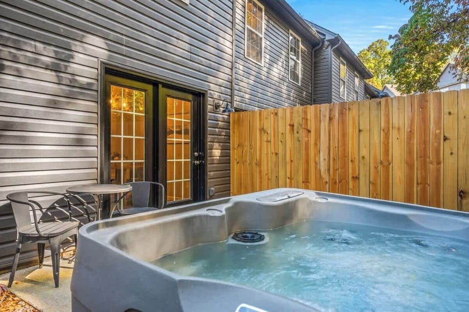Welcome to the Great Smokies! And step into a luxury with a charming hideaway featuring a private patio, complete with a bubbling hot tub just for you. And an outdoor dining area for two!