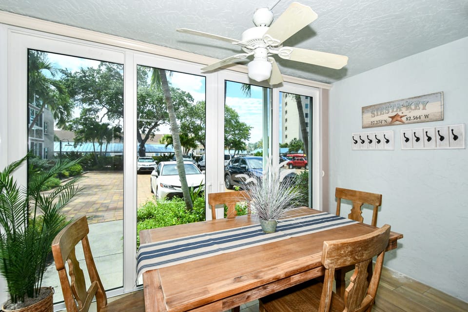 Sliding glass doors that lead to the fitness center and first pool