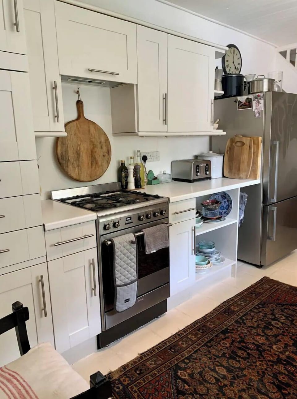 Kitchen, with Smeg cooker, large fridge/freezer, and dishwasher.