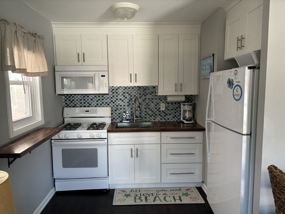 Kitchen with full-size appliances and necessities to make you feel at home.