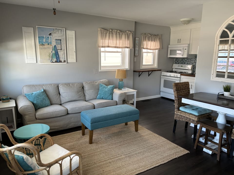 Open living, dining, and kitchen.