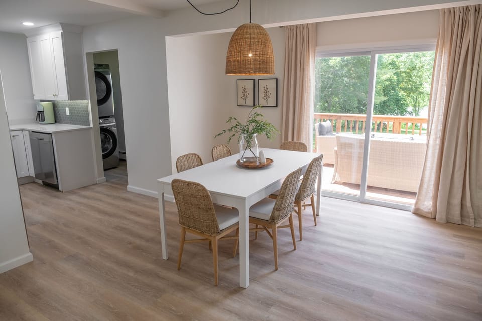 Eating area  leading to one pristeen acre looking out to waterfront