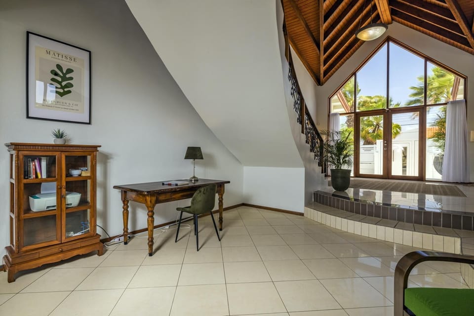 As you enter this property, you will be astounded with its floor-to-ceiling glass entrance door and wide and spacious entryway.