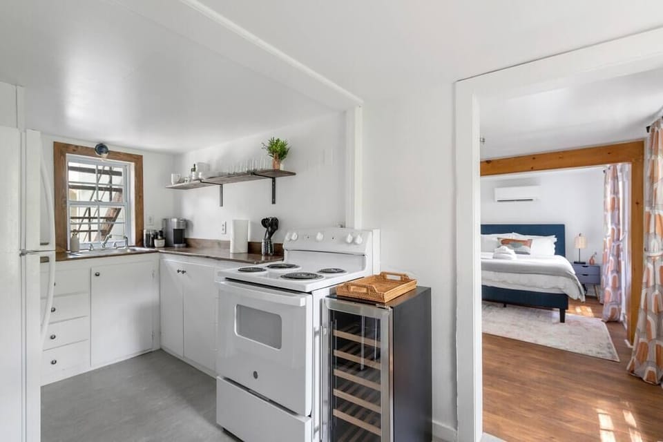 Kitchenette in downstairs apartment - full-sized range and basic cooking equipment