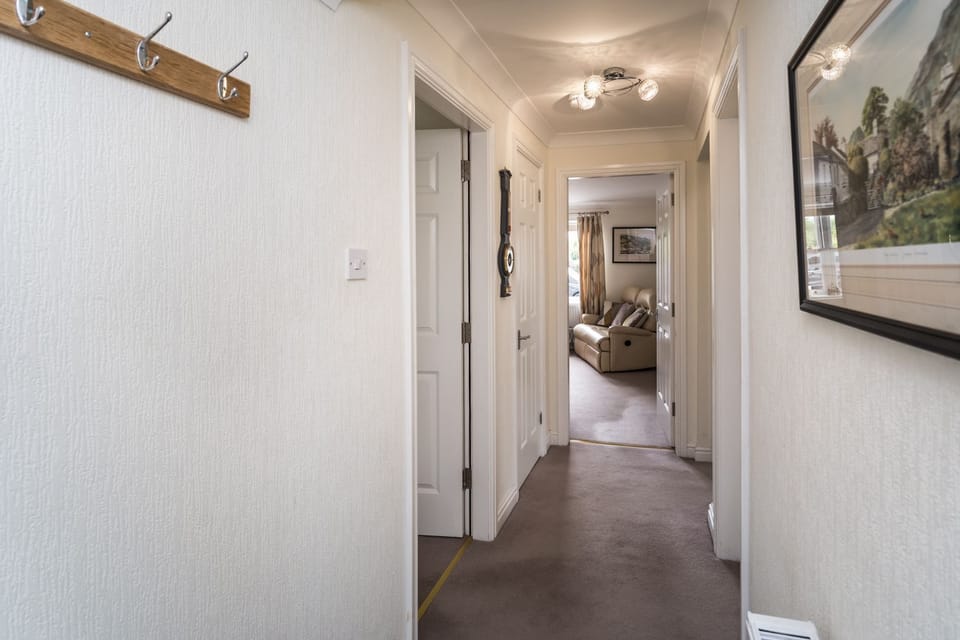 The front door leads into the entrance hall, with room for muddy boots and coats