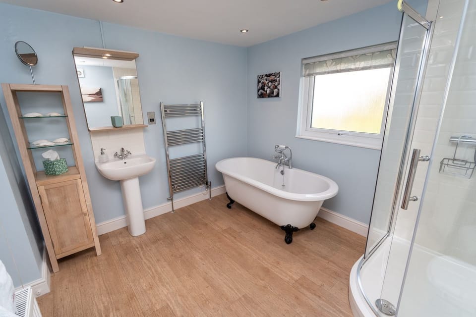 A large bathroom can be found on the 1st floor