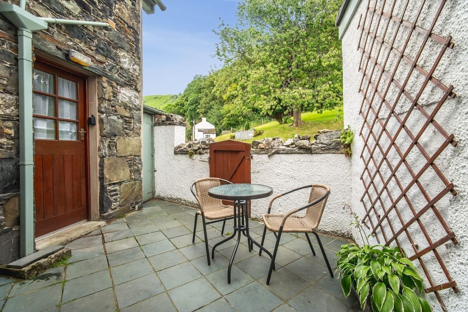 At the rear of the property is a lovely patio and seating area with access to the kitchen