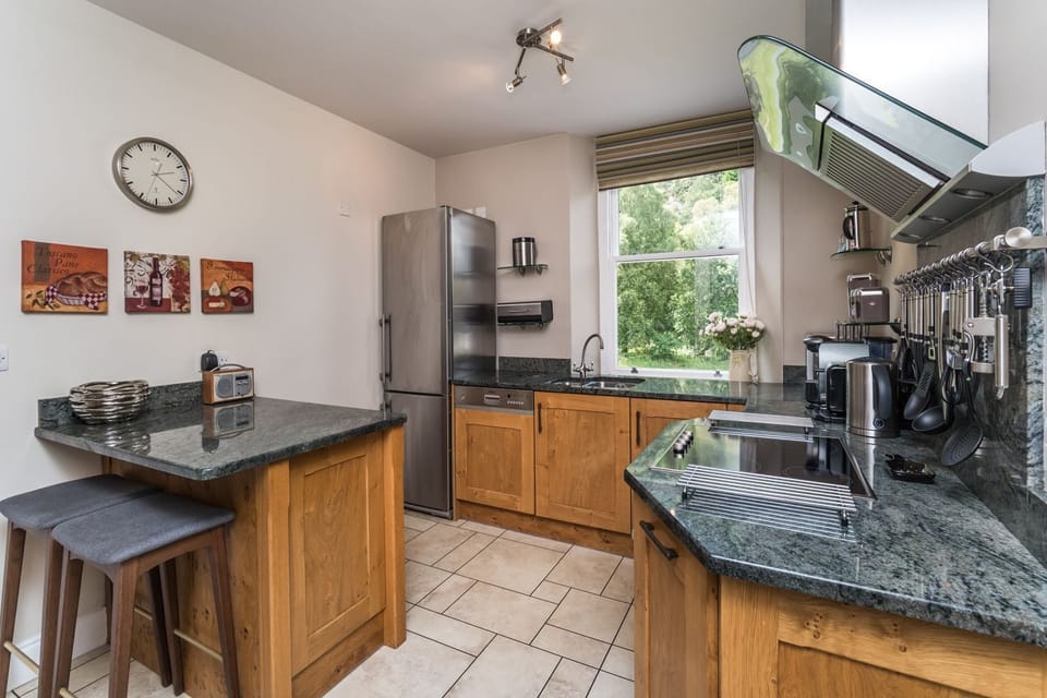 A high spec kitchen looks out onto Barf Fell