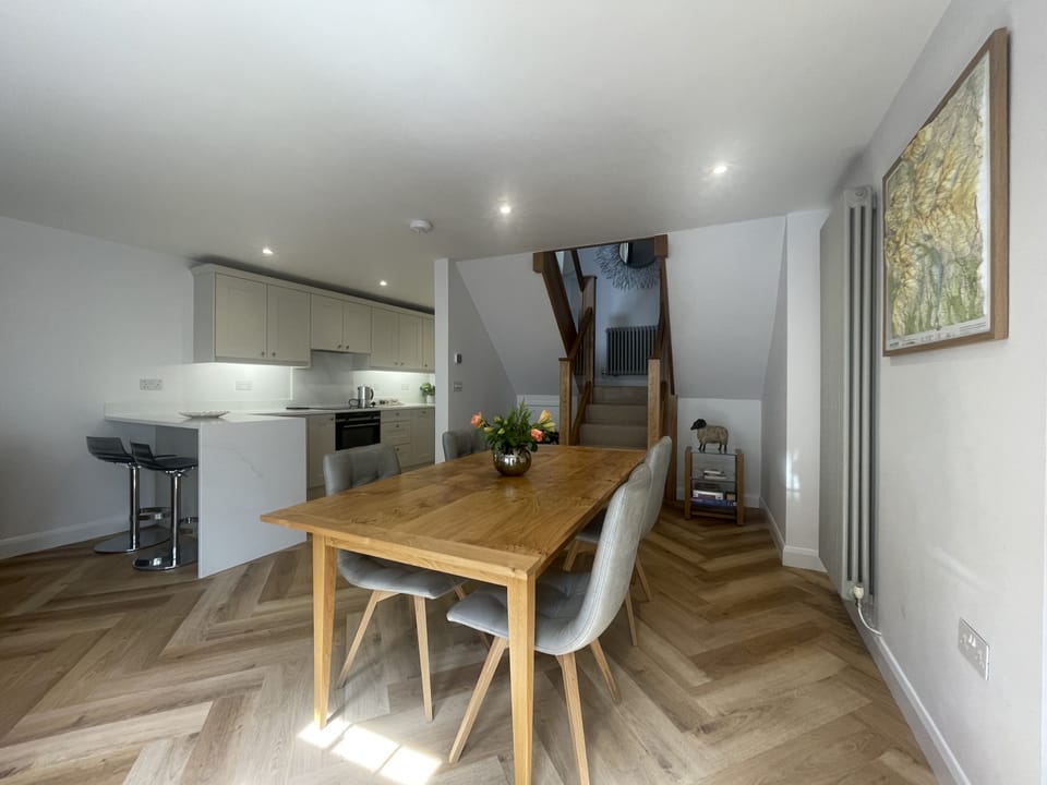 A large dining table gives plenty of space for breakfasts and dinners for all the family