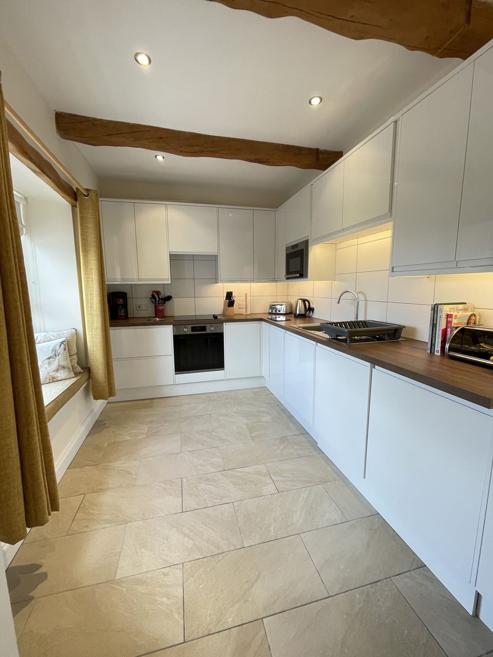 Enjoy your morning brew admiring the fells from the window seat in the kitchen