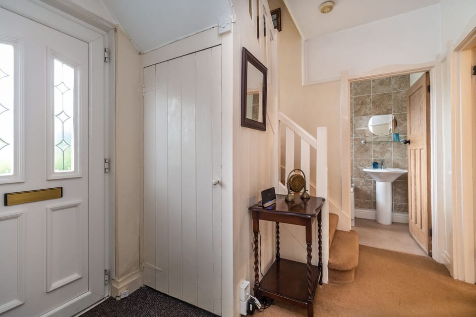 The ensuite shower room is found off the twin bedroom at the rear of the property