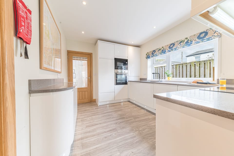 From the dining room you enter the spacious kitchen