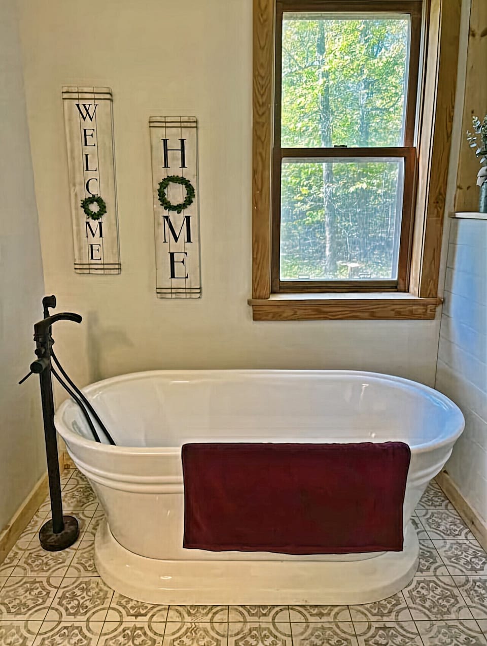 Spa Retreat: Indulge in tranquil soaks with nature views and charming decor in your private bath!