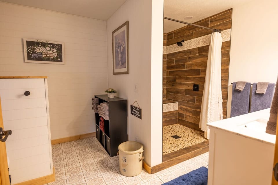 Primary Bath: Custom dual head shower with on demand hot water