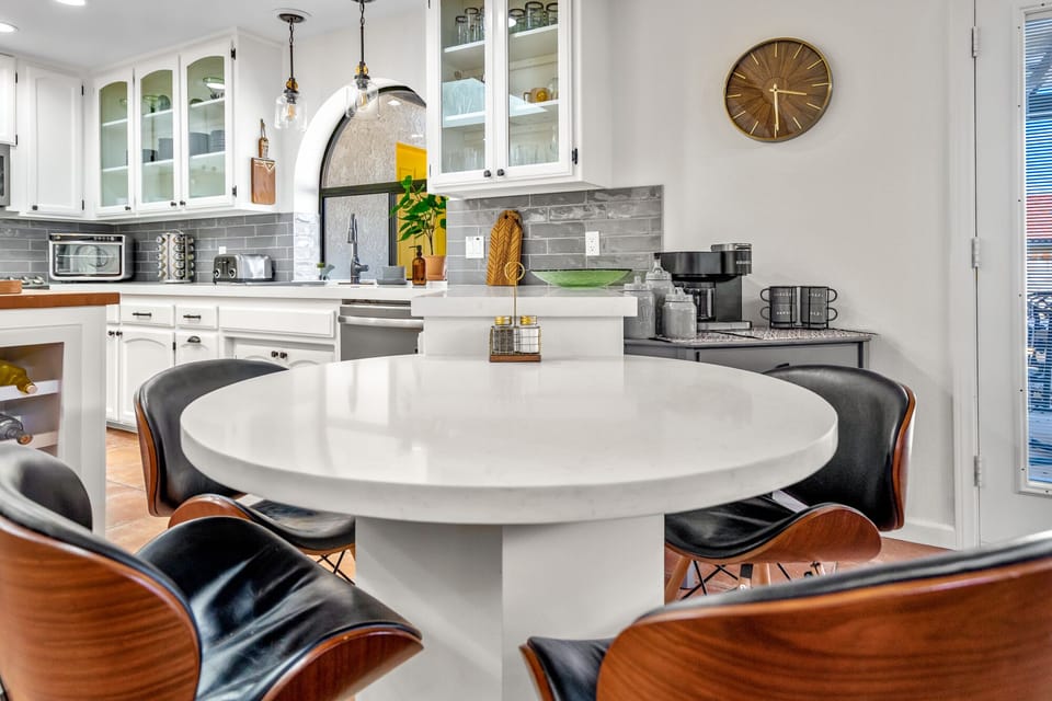Quartz breakfast table located in the gromet kitchen next to the coffee bar!