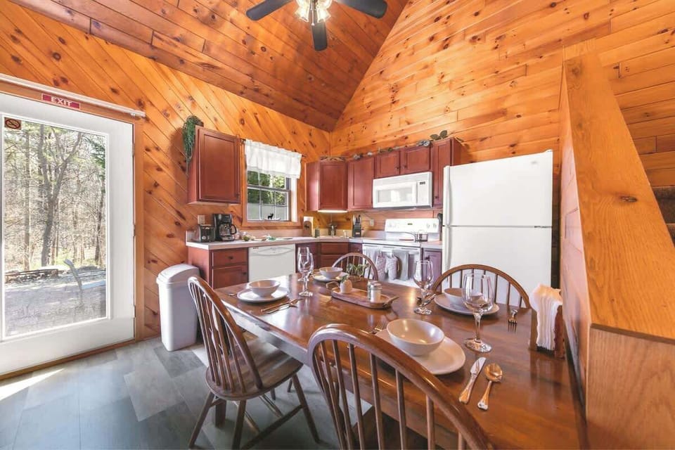 A full size oven, refrigerator, dishwasher, microwave, toaster, and coffee pot are only some of the amenities included in this fully-stocked kitchen.