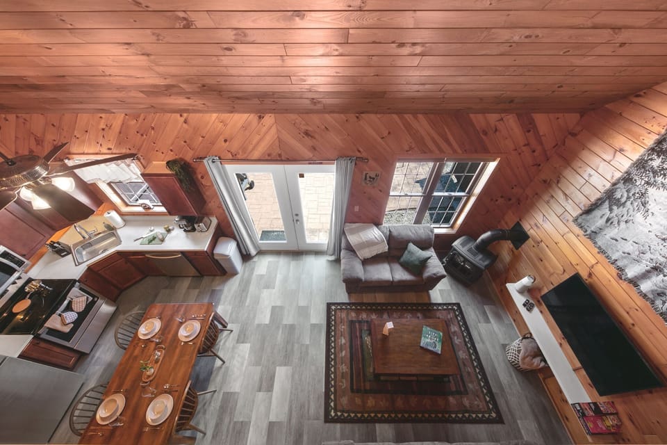 Overlook the main living areas (living room, kitchen/dining) from the loft