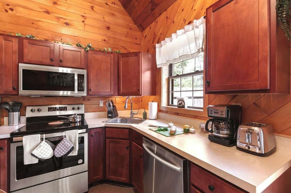 Feel right at home in the open kitchen, where all of the cookware, utensils, and dishware you’ll need to whip up a meal from scratch or dig into some takeout can be found!